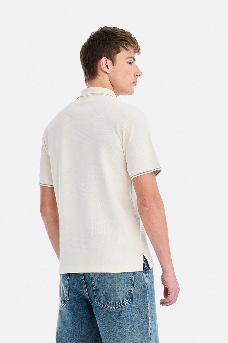 Polo en tricot texturé extensible